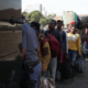 Migrants line up to leave South Africa on Monday, June 30, 2026, as an unofficial deadline set by anti-immigration groups demanding their departure took effect. Nearly 25,000 foreign nationals left the country amid the crisis, while many others sought refuge in community centers, churches and makeshift camps. Screenshot / Sky News